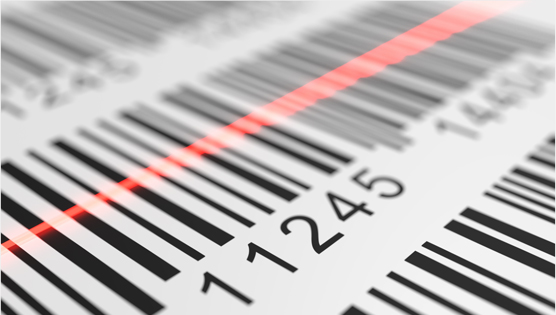 A close-up of barcode labels with a red laser scanner line moving across them.